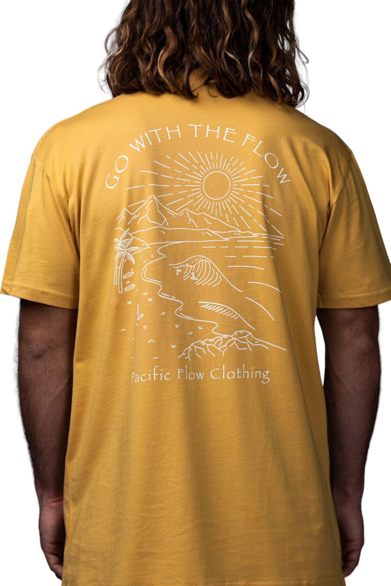 a view of the mountains, the ocean, a surfer and the shipwreck from Byron Bay on a mustard shirt